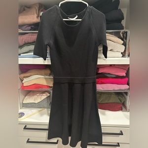 Great versatile work dress. Trina Turk. black knit. Worn only a few times